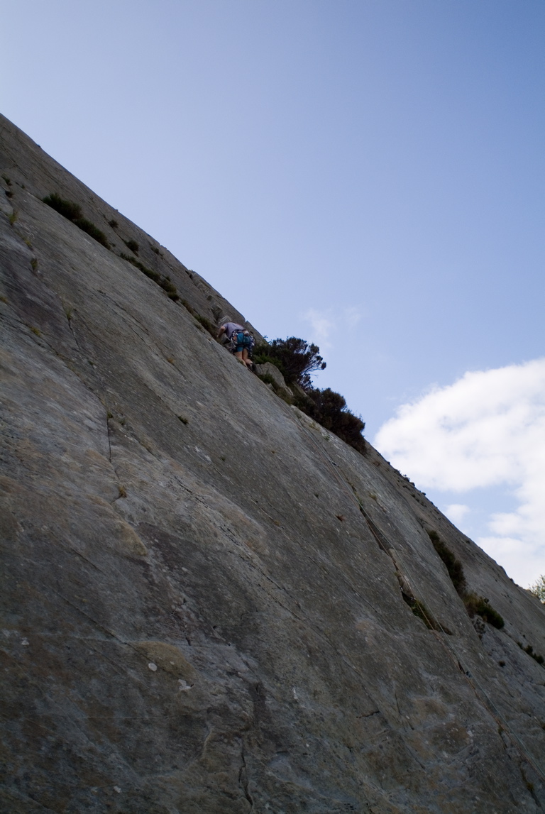 Andy leads "Crack 2" at Barmouth Slabs.